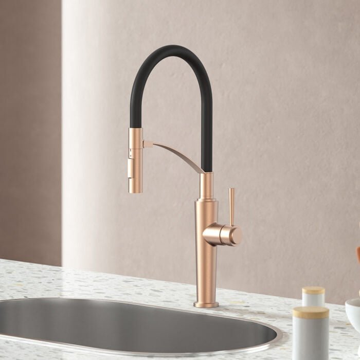 Rose gold pull down kitchen faucet with stepped design