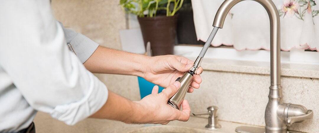 Install kitchen faucet with pull-down sprayer
