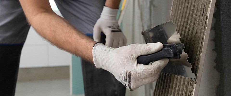 Use a notched trowel to spread thinset