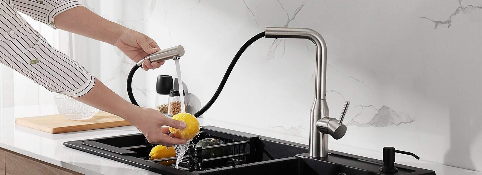 Chrome kitchen faucet with gravity ball