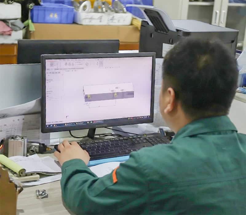 A Lanerdi engineer is designing a new shower mixer valve product A Lanerdi engineer is designing a new shower mixer valve product