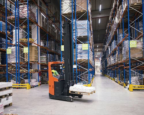 Industrial building large warehouse interior with forklift and p