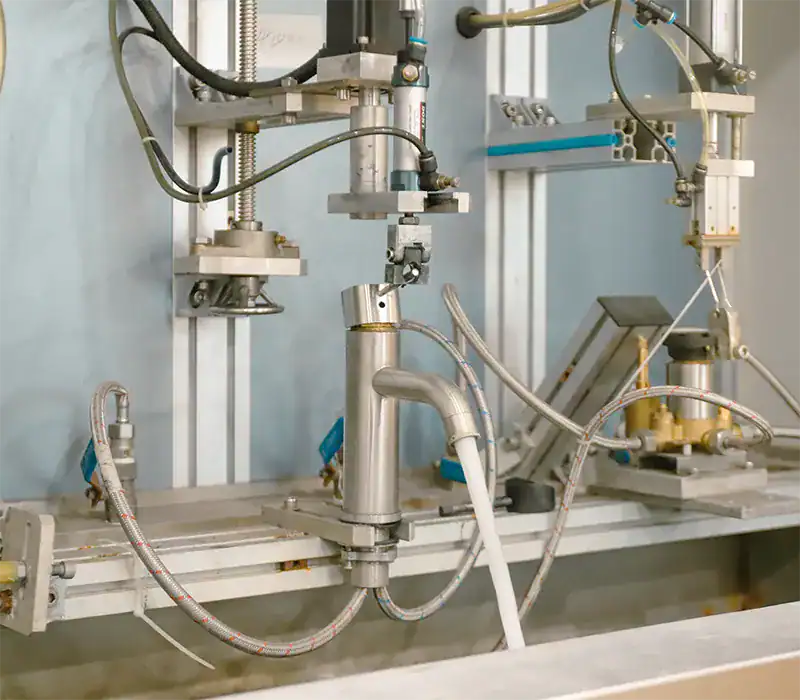 A basin faucet is undergoing life testing in the lab of Lanerdi faucet factory