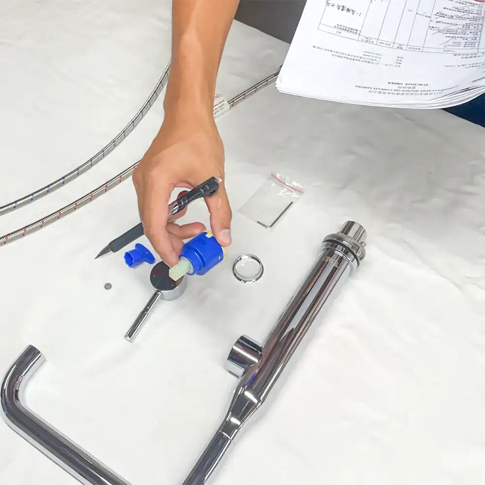 an engineer is check the kitchen faucet configuration Engineer checking a faucet configuration against an order drawing